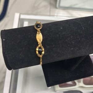 Elegant Gold and Black Bracelet